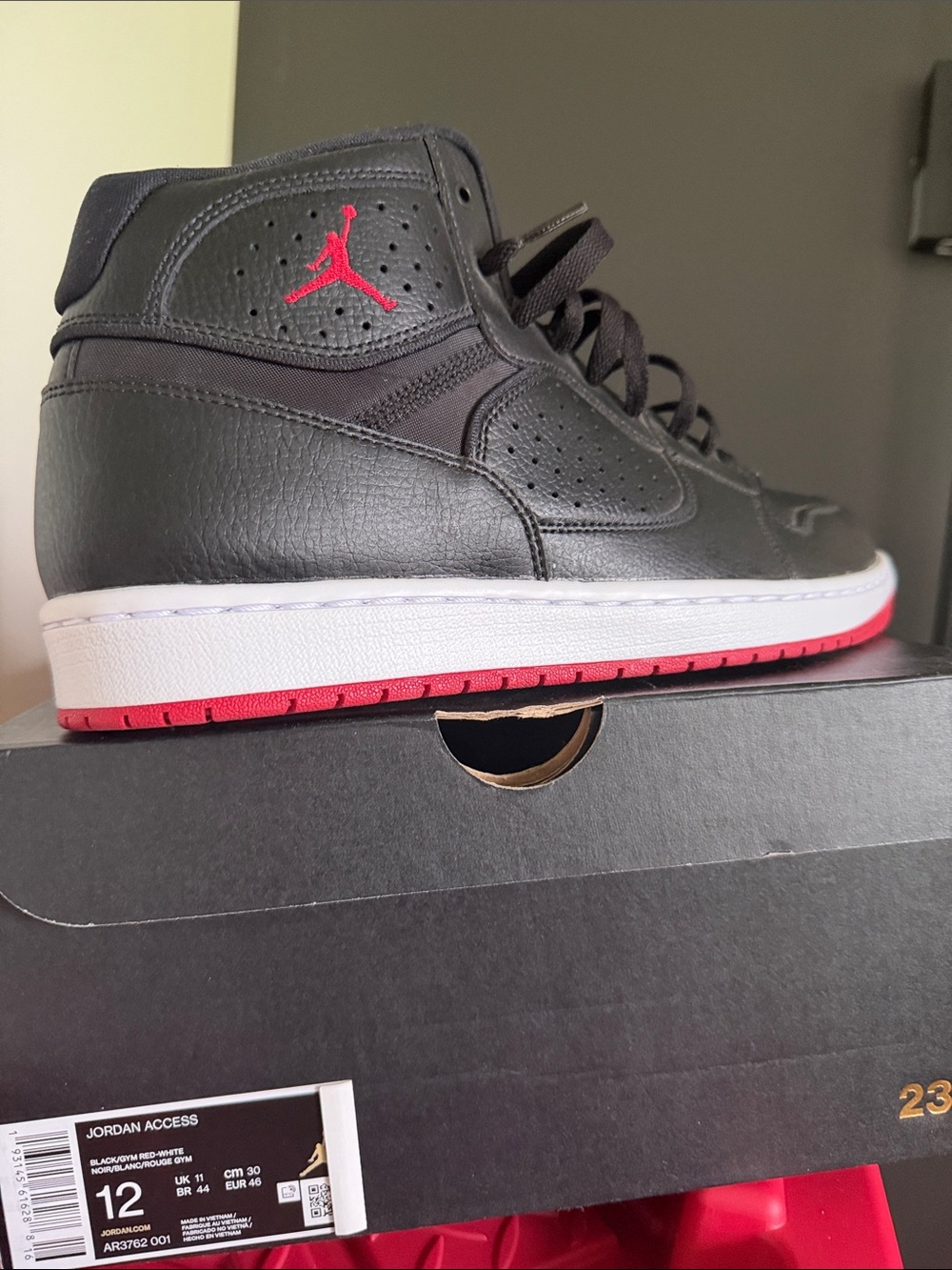 Jordan Black and Red Mid-Top Sneakers